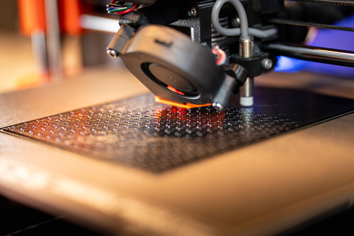 3D printer producing a physical plastic prototype