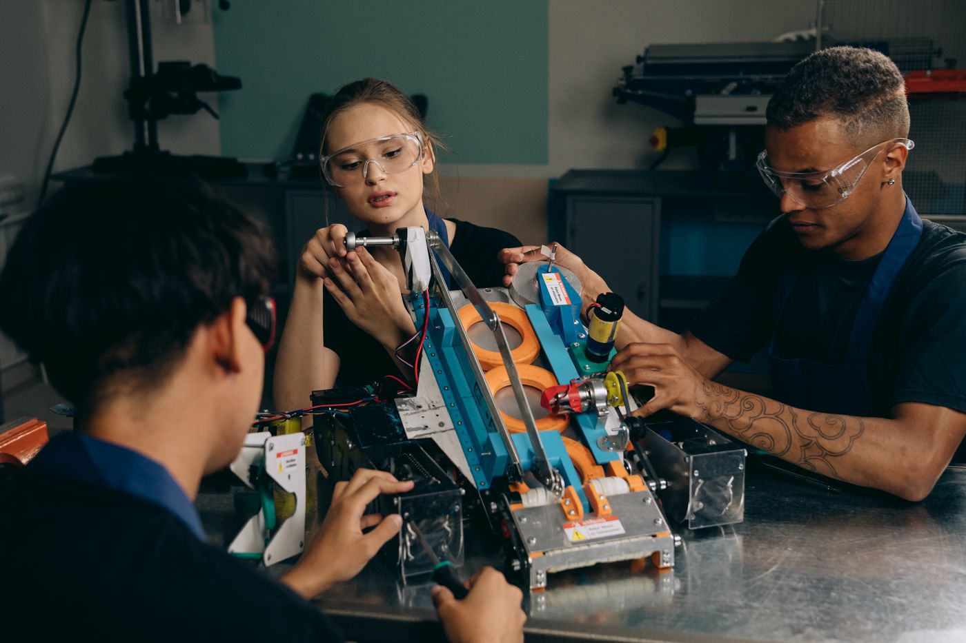 Engineering group assembling and reviewing robotic hardware