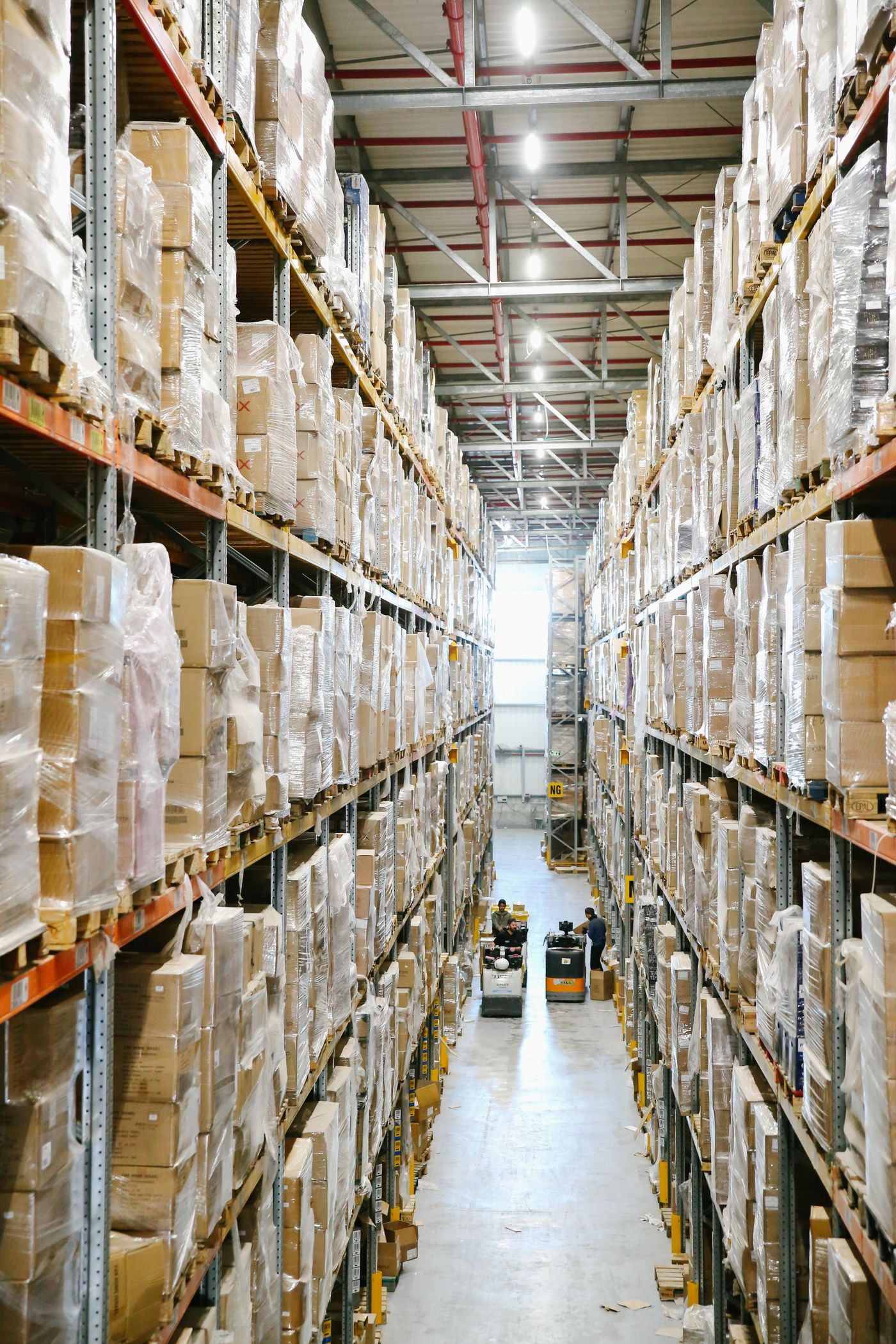 Warehouse storage aisles with shelves and packaged inventory